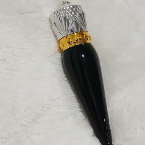 Elegant Red Lipstick with Silver and Gold Accents